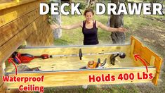 a woman standing next to a wooden deck with tools in it and the words deck drawer above her