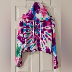 Psk Collective Tie Dye Cropped Hoodie! Hand Tie Dyed By Me! New With Tags! These Adorable Crop Hoodies Are Each One Of A Kind I Have Other Sizes And Styles Available! Perfect Any Season Hoodie! Colors: Sky Blue, Light Magenta, Grape, Green. Materials: 60% Cotton/ 40% Polyester Size: Extra Large Tie Dye Sweatshirt For Winter, Casual Purple Hooded Hoodie, Purple Hoodie Top For Spring, Purple Spring Hoodie Top, Tie Dye Cotton Top With Drawstring Hood, Purple Relaxed Fit Hoodie With Drawstring, Purple Relaxed Hoodie, Tie-dye Hooded Top With Drawstring, Casual Purple Hoodie For Loungewear