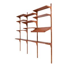 a wooden shelf with several shelves on it