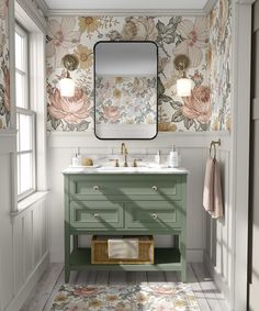 a bathroom with floral wallpaper and green vanity