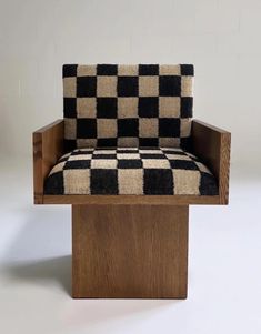 a black and white checkered upholstered chair