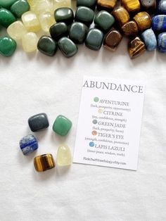 "Crystals for Abundance The crystal in this set has been carefully selected to help you fill your life with wealth, success, and joy. Along with the hand-selected crystals in a cotton pouch, you will receive a guidance card explaining the stones' meaning and properties.  Crystals are hand-selected. Each stone's unique shape, color, and size may not be identical to those in the photo. The set contains 5 tumbled stones. The 5 Crystals included are; *  Aventurine -  will bring abundance by transforming your mind into settling more positive spaces. It is also a stone that can bring about action and strong leadership qualities and encourage you to keep on going despite what challenges you are facing. *  Citrine - crystals are used for abundance and creativity. They have a strong vibration that Crystal Tumble Display, Crystals For Abundance, Crystals For Wealth, Keep On Going, Lapis Lazuli Crystal, Leadership Qualities, Cotton Pouch, Crystal Energy, Crystal Therapy