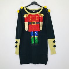 Approximate Measurements: Length 31 In., Width 18.5 In. Black Nutcracker, Ugly Christmas Sweater Dress, Christmas Sweater Dress, Sweater Dress Black, Nutcracker, Ugly Christmas, Christmas Sweater, Being Ugly, Dress Black