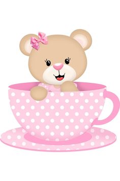 a teddy bear sitting in a pink cup with polka dots on the rim and smiling