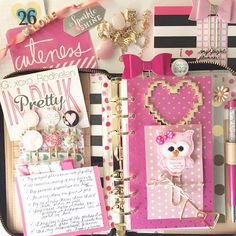 an open planner book with pink and gold accessories on it, including a notepad