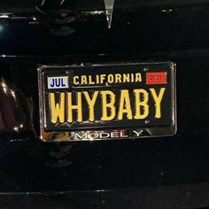 a license plate on the back of a car that says whybaby in modern california