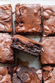 brownies with chocolate frosting cut into squares