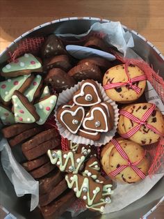 a basket filled with lots of different types of cookies