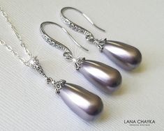 Wedding Swarovski Mauve Light Purple Lilac Teardrop Pearl Earrings Necklace Jewelry Set with .925 Sterling Silver Chain. CHAIN is 18 inches (45.7cm) long. EARRINGS are about 1.33 inch (3.4cm) long from top of earring wire to bottom. PENDANT is about 1.10 inch (2.8cm) long including bail. JEWELRY SET SECTION: https://www.etsy.com/shop/LanaChayka?ref=seller-platform-mcnav&section_id=18873488 BRIDAL JEWELRY SETS SECTION: https://www.etsy.com/shop/LanaChayka?ref=seller-platform-mcnav&section Silver Pear-shaped Bridal Necklace For Formal Occasions, Formal Silver Bridal Necklace Pear Shaped, Formal Silver Pear-shaped Bridal Necklace, Silver Bridal Necklace With Pear Shape As Gift, Silver Pear-shaped Bridal Necklace Gift, Classic Silver Drop Bridal Necklace, Silver Drop Bridal Necklace For Formal Occasions, Silver Bridal Necklace With Pearl Drop For Formal Occasions, Silver Teardrop Bridal Necklace With Pearl Drop