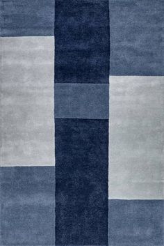 an area rug with blue and white squares on it, in the shape of rectangles