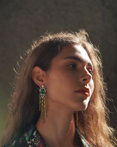 Long Bohemian Tassel Earrings Green Stone Emerald Boho Chic Earrings Big Statement earrings Crystal Gold French Vintage Jewelry Diwali Decide your destiny, and claim your place in the pantheon of fashion mavens who dare to define their own aesthetic narrative. Handcrafted in 24kt gold plated and black plated brass. Our premium grade brass is completely skin friendly coated with electrophoretic coating which adds a very lasting life to the jewellery in addition to making it scratch resistant. The Big Statement Earrings, Emerald Green Earrings, Boho Chic Earrings, Earrings Aesthetic, Earrings Big, Jewels Rings, Chic Earrings, Boho Green, Earrings Crystal