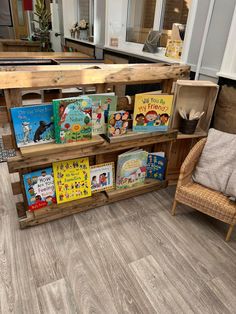 there is a book shelf with many books on it