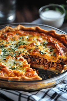 a close up of a pie on a plate