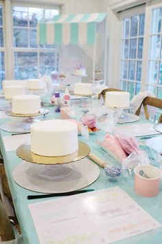 the table is set up for a baby's first birthday party