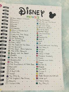 the disney movies list is shown on a notebook