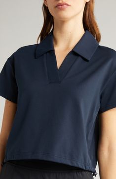 Take your pickleball or tennis game to the next level in this polo-inspired top cut from a superstretchy nylon blend and finished with an adjustable hem. 19 1/2" length (size Medium) Spread collar Short sleeves Drawcord-toggle hem 91% nylon, 9% spandex Machine wash, tumble dry Imported Functional Sports Polo Collar Tops, Functional Polo Collar Sports Tops, Functional Collared Sports Top, Moisture-wicking Polo Collar Top, Functional Moisture-wicking Polo Collar Top, Functional Moisture-wicking Polo Top, Moisture-wicking Polo Collar Golf Top, Athleisure Sports Top With Polo Collar, Moisture-wicking Cotton Polo Collar Tops