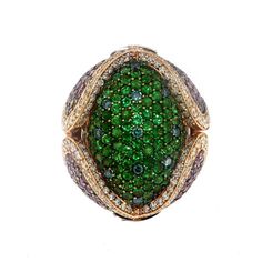 For Sale on 1stdibs - This bombe cocktail ring is a triumph of colorful precious gemstones featuring 2.92 Carats of Tsavorite Garnet at the dome with 3.69 Carats of Pink Sapphires, Luxury Oval Green Dome Ring, Luxury Green Domed Ring, Luxury Green Dome Ring For Formal Occasions, Ring Blue Sapphire, Diamond Cocktail Ring, Tsavorite Garnet, Diamond Cocktail Rings, Ring Blue, Blue Sapphire Rings