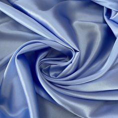 Silk Satin with Elastane Natural Fabrik Sky Blue color plain dyed fabric Width: 55.12 inch ( 140cm) listed for one Yard  Colors: Bright Light Blue Materials: 95% silk, 5% Elastane 16 mm Made in Italy Natural silk fabric is a luxurious and highly prized material that is made from the cocoon of the silkworm.  It has a soft, lustrous texture and is known for its durability and strength.  Silk fabric is often used in high-end fashion and home decor due to its natural sheen and drape. Soft and romant Hermes Moodboard, Eaton Centre, Color Plain, Sky Blue Color, Blue Palette, Bridal Fabric, Blue Texture, Premium Colors, Fabric Texture