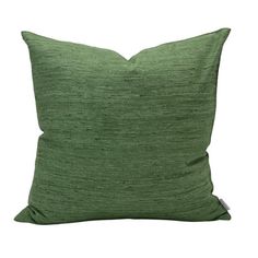 a green pillow on a white background