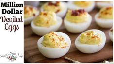 deviled eggs on a cutting board with the words, million dollar deviled eggs