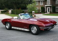 a red sports car parked in a parking lot