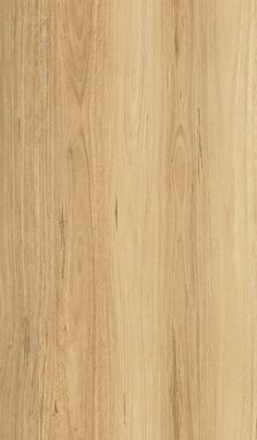 a close up view of the wood grains on this flooring material, which is light brown in color