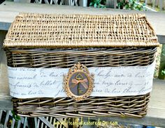 a wicker box sitting on top of a wooden bench