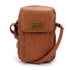 Wallet Type: Crossbody WalletFeatures: Adjustable StrapsCard Capacity: 4 SlotsClosure Type: Snap & ZipperPockets: 1 Front Snap Pocket, 4 Inside Card SlotsMetal Color: Gold ToneMeasurements: 5 Width/Inches, 7.25 Height/Inches, 3 Depth/InchesDrop Length: 20 InchesBase Material: 100% VinylFabric Description: VinylCare: Wipe CleanCountry of Origin: Imported Womens Wallets, Womens Wallet, Wristlet Wallet, Small Accessories, Wristlets, Handbag Accessories, Wallets For Women, Cognac, Card Slots