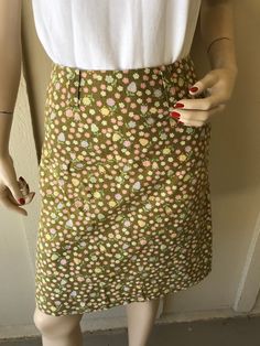 Vintage 1960's Skirt ~ Patty Woodard, California, Olive Green W/ Tiny Pink Flowers, Zips Up The Back With Big & Wide Belt Hoops Belt ~ Great Condition I will be mailing this Priority Mail and First Class International. Measurements Skirt Waist 24 Inch Hips Bone 32 Inch Tush 36 Length 21 Inch Vintage Fitted Cotton Skirt, Retro Spring Skirt With Pockets, Retro Skirt With Pockets For Spring, Retro Cotton Skirt With Pockets, Vintage Fitted Pleated Skirt, Retro Cotton Skirt For Spring, Retro Fitted Skirt With Pockets, Fitted Vintage Mini Skirt, Retro Cotton Skirt