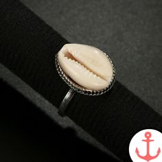 Introducing the Vintage Oyster Shell Ring - The Perfect Accessory for Nautical Enthusiasts If you're a passionate lover of the sea and all its mesmerizing symbols, then you're in for a treat with our Vintage Oyster Shell Ring. This exquisite piece of nautical jewelry is designed to capture the essence of the ocean, allowing you to carry its beauty and tranquility wherever you go. With its unique design and meticulous craftsmanship, this shell ring is a must-have for any sea lover. As a part of o Shell Rings, Bohemian Accessories, Nautical Jewelry, Shell Ring, Glam Style, Oyster Shells, Knuckle Rings, Cowrie Shell, Oyster Shell