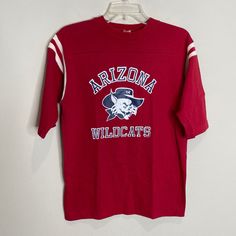 Rare Vintage Artex 1975 University Of Arizona Wildcat T-Shirt Half Sleeve Crew Neck Gender: Unisex Size: M *Approximate Measurements Lying Flat: -Pit To Pit: 18.75” -Length: 25.5" Special Note: This T-Shirt Personally Purchased Almost 50 Years Ago From The U Of A Bookstore In Tucson Arizona. Condition Notes: Good Pre-Owned Condition. There Were 2 Small Repaired Holes In Front. Please See The Last Photo Arizona Wildcats, Tucson Arizona, University Of Arizona, Half Sleeves, Wild Cats, Arizona, University, Tee Shirts, Mens Shirts