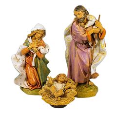 two figurines of the birth of jesus