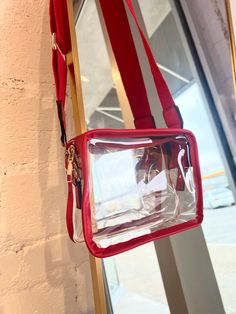 The perfect accessory for game day! Clear Stadium Bag Removable Scarf Detail Large Capacity Crossbody Pouch For School, Trendy Red Bags With Clear Strap, Daily Use Crossbody Bag With Clear Strap, Modern Red School Bag, Red Rectangular Bag With Clear Strap, On-the-go Rectangular Shoulder Bag With Clear Strap, Sporty Rectangular Bags With Adjustable Strap, School Tote Bag With Clear Strap, School Crossbody Box Bag With Removable Pouch