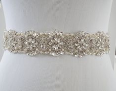 a bridal belt with pearls and crystals