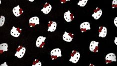 black and white hello kitty fabric with red bows