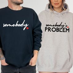 "The \"Somebody's Problem\" couples matching hoodie adds a humorous touch to your wardrobe, making it a delightful and funny matching gift for couples, perfect for celebrating Valentine's Day in style. Welcome to NIOBE BOUTIQUE. I am happy to see you in my shop. My main purpose is to meet you with a high-quality product. I use the best product to make you happy. Your satisfaction is my priority.  Placing an order is simple!  *Please review all images in this listing for style, color, and sizes.  *Select your t-shirt color and size from the drop-down menus.  *Choose your quantity as much as you need. *Please click the \"Proceed to Check Out\" button *Finally, your shirts will be ready to ship 1-3 Business Day. If you have any difficulties, send me a message. The size chart and color chart i Couples Cotton Hoodie With Crew Neck, Funny Matching, Funny Couple, Gift Valentines Day, Couples Sweatshirts, Funny Couples, Couple Matching, Matching Gifts, Couples Matching