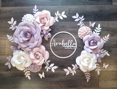 paper flowers are arranged in the shape of a circle