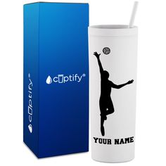 a cup with a straw in it next to a box and the logo for cubity