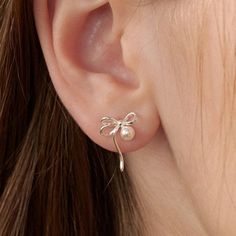 Sterling Silver Bow Earrings with Swarovski Pearl, Elegant Bow Studs, Perfect Bridal Jewelry, 925Silver Jewelry,Gift for Her (EC3085) ▶Product Info. - Material: 925 Sterling Silver / Swarovski Pearl - Metal Finish: 14K Gold / Silver + Anti-Tarnish E-Coat  - Safety: Nickle & Lead free and Hypoallergenic - Dimensions: Swarovski pearl - 4mm / Ribbon - 21.7mm x 16.5mm - Weight: 1.0g (Weight of Silver clutch was excluded) -  1 Pair of TATIANA & Silver 925 engraved ear clutch was included. - Made In S