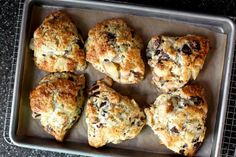 six scones on a baking sheet ready to be baked in the oven or used as an appetizer