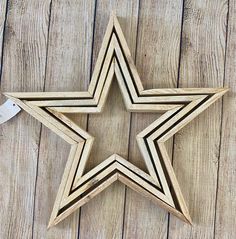 a wooden star cut out from pieces of wood