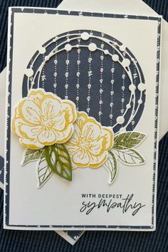 a close up of a card with flowers on it