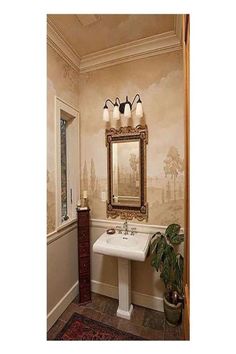 a bathroom with a sink, mirror and rug on the floor in front of it