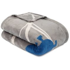 two gray and blue blankets folded on top of each other, one with an elephant design