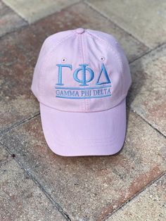 PLEASE READ THE ENTIRE DESCRIPTION! ALSO, SEND US A MESSAGE AT CHECKOUT WITH YOUR NAME OR TEXT AND FONT CHOICE (LISTED IN PICTURES). At checkout please include in the NOTE TO SELLER SECTION: 1) WHAT LETTERS YOU WOULD LIKE ON YOUR HAT. If you are having the words spelled out PLEASE PUT THEM EXACTLY HOW YOU WOULD LIKE THEM. PLEASE INDICATE IF YOU WANT GREEK LETTERS ONLY OR IF YOU WANT Greek letters and the text in between the lines. If there is no note then the design will be made with Greek lette Sorority Beanie Hats, Adjustable Hats With Letter Print For Graduation, Phi Gamma Delta, Delta Sorority, Monogram Hats, Personalized Hats, Greek Sorority, Gamma Phi, Hat Custom