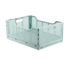 a white plastic crate with two handles on the bottom and one side open to show it's contents