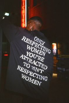 a man standing in front of a neon sign that says only respect women you're attracted to isn't expecting women