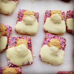 some cookies with icing and sprinkles on them