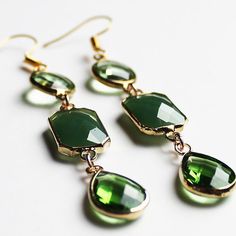 These cute hand-crafted faceted green multi-tier Crystal Earrings come in multiple designs Stone: Crystal Colour: Green Metal: Gold Plated Earring Size: 7cm Drop x 1cm Width (3 tier) or 5cm Drop x 1cm Width (2 tier) Green Faceted Drop Earrings, Green Faceted Earrings For May Birthstone, Green Emerald Dangle Chandelier Earrings, Green Crystal Earrings For May Birthstone Party, Green Dangle Jewelry With Faceted Beads, Green Dangle Crystal Earrings For Gift, Nickel-free Green Drop Crystal Earrings, Handmade Green Crystal Drop Earrings, Green Crystal Drop Earrings For Gift