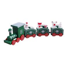 a green toy train with santa's sleigh and reindeers on it